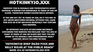 Hotkinkyjo deep fake penis pummel and tummy swelling at the public beach