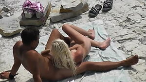 Spycam Slender light-haired Milks and her beau at beach